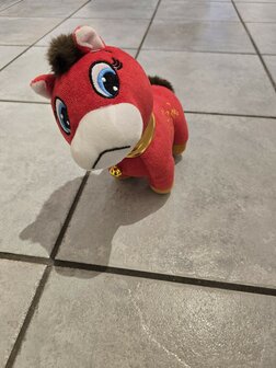 Pluche verdrietige / blije rode pony